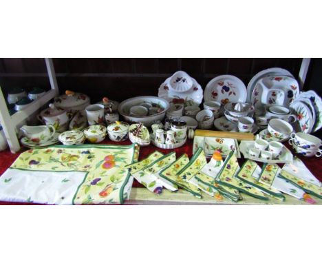 An extensive collection of Royal Worcester Evesham pattern wares including serving dishes, avocado dishes, tureens and covers