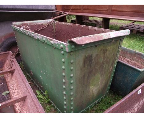 A vintage galvanised steel trough of rectangular and tapered form with riveted seams and rounded lip ends, 100 cm long x 50 c