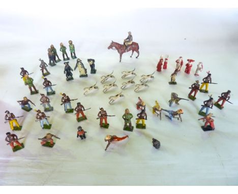 A collection of antique painted lead farmyard models, mostly by Britains to include numerous horses, cattle, farmers and farm