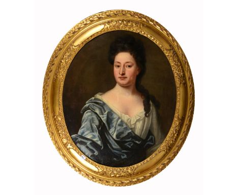 An early 18th century oil painting on canvas laid onto board of oval form and showing a half length portrait of a lady in blu