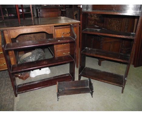 A small stained oak freestanding bookcase with four fixed shelves, together with a further stained pine wall mounted flight o