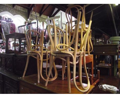 A set of six light beechwood Bentwood café chairs with circular panelled seats