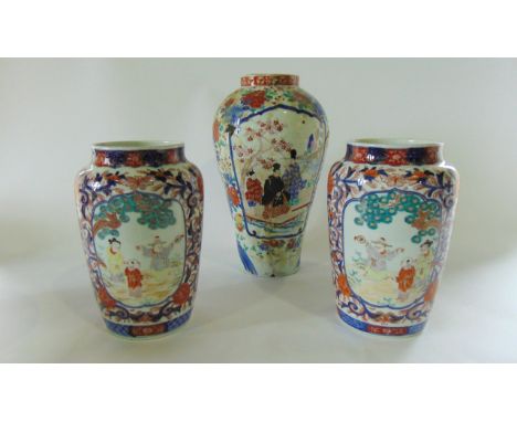 A pair of late 19th century Imari vases tapering cylindrical form each with two polychrome painted panels of children playing