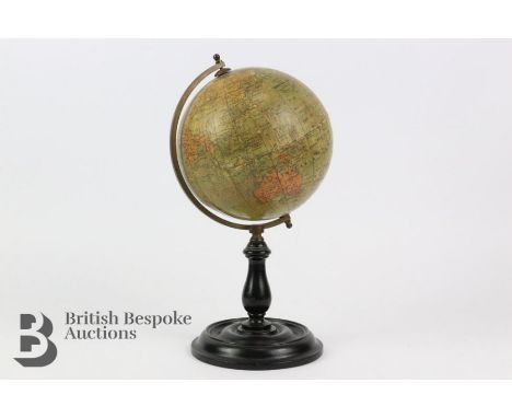 George Phillip's 6" Terrestrial globe, on turned stand, approx 26 cms.&nbsp;

Note: with some loss and crease to the equator 