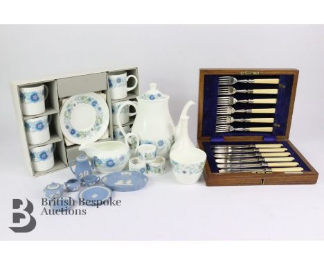 Wedgwood cobalt blue miniature tea set, comprising tea pot, sugar bowl, milk jug, tea cup and saucer, cake plate and a trinke