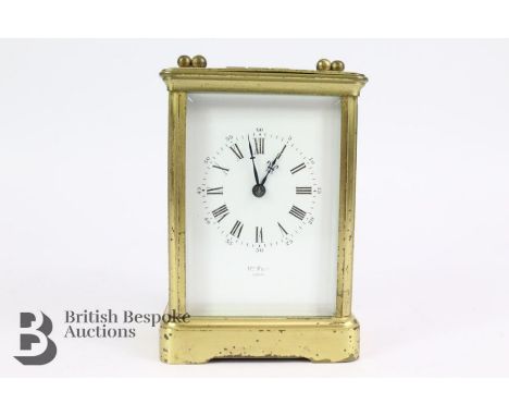 French Henry Marc of Paris, 19th century brass carriage clock, white enamel face set with both Arabic and Roman dial, approx 