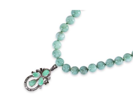 A GROUP OF JADE JEWELLERY Featuring a jade bead strand measuring approximately 6-9.5mm, mounted to a white gold clasp marked 