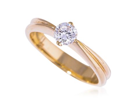 A DIAMOND SOLITAIRE RING Featuring a round brilliant cut diamond totalling approximately 0.35 Cts, mounted in a yellow gold s