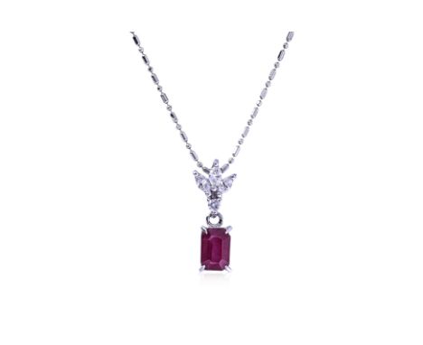 A RUBY AND DIAMOND PENDANT ON CHAIN
The emerald cut ruby weighing approximately 1.19cts (marked), beneath a diamond set bail 