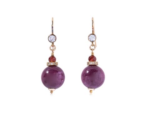 A PAIR OF RUBY BEAD, GARNET AND TOPAZ DROP EARRINGS Featuring ruby beads mounted in an unmarked yellow gold setting accented 