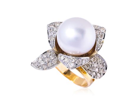 A CULTURED BAROQUE PEARL AND DIAMOND 'ORCHID' RING Featuring a cultured baroque pearl, mounted in an unmarked yellow gold set