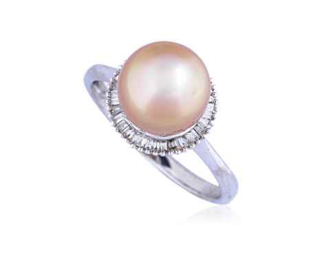 A CULTURED SOUTH SEA PEARL AND DIAMOND RING
Featuring a drop shaped cultured golden south sea pearl measuring approximately 9