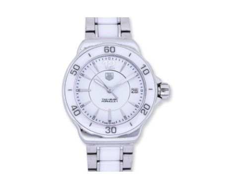 A LADIES TAG HEUER FORMULA 1 BRACELET WATCH Circa 2011, Stainless steel and white ceramic, quartz movement, the white dial wi