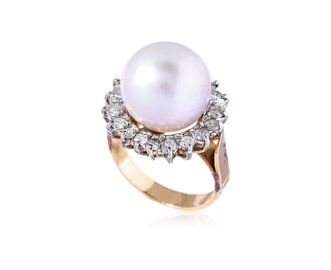 A CULTURED PEARL AND DIAMOND RING Featuring a cultured pearl measuring approximately 12.6mm, mounted in an unmarked two tone 