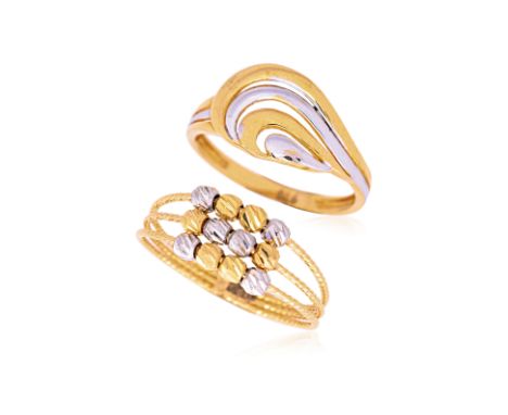 TWO WHITE AND YELLOW GOLD RINGS
One example with 12 beads to head, the other with two-tone swirl, one marked '916' for 22K an