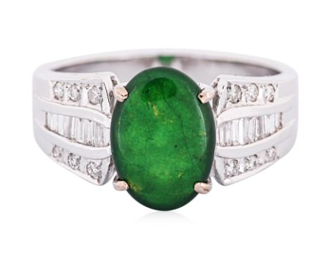 A JADE DOUBLET AND DIAMOND RING Featuring a jade doublet mounted in an unmarked white gold setting, likely high carat, accent