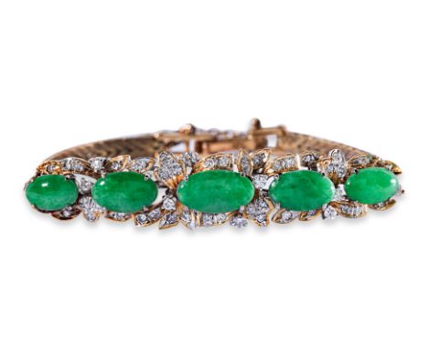 A JADE AND DIAMOND BRACELET Featuring five jade cabochons mounted in a yellow gold setting marked '18K', accented with single