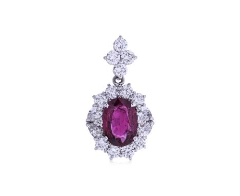 A RUBY AND DIAMOND CLUSTER PENDANT The oval ruby, weighing approximately 1.395cts, within a surround of round brilliant cut d