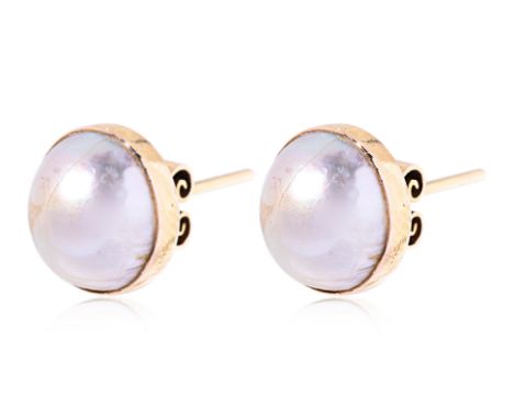 A PAIR OF CULTURED MABE PEARL STUD EARRINGS Featuring a pair of cultured mabe pearl mounted in a yellow gold setting marked '