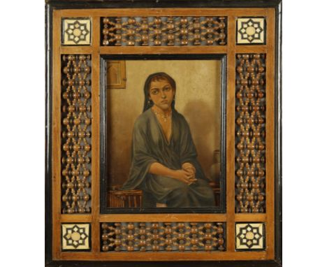 Islamic Art A woman's portrait within a fretwork wooden frame Oil on cardboard Mid 20th century . . Cm 20,50 x 26,50. Provena