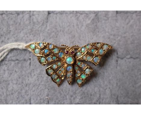 Fine Ladies 9ct Gold Opal Set Butterfly design Brooch with Ruby set eyes 5.2g total weight 