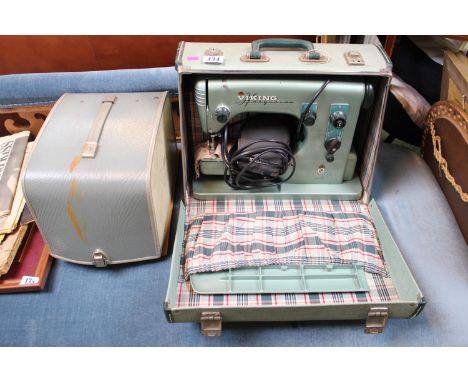 Cased Husqvarna Viking Sewing machine with Pedal and a cased Braun Projector 