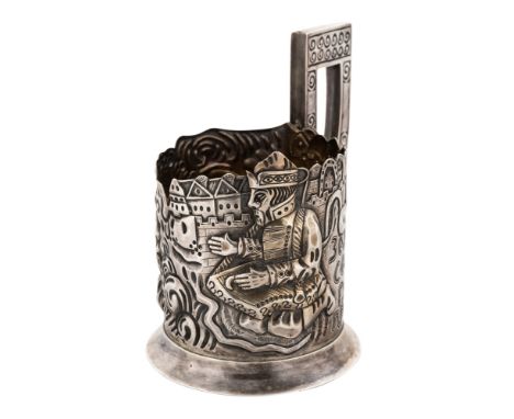 A RUSSIAN SILVER TEA GLASS HOLDER IN THE PAN-SLAVIC STYLE, MOSCOW, 1908-1917finely chased and repousse with pan slavic geomet
