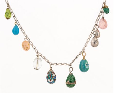 AN ANTIQUE RUSSIAN GOLD, SILVER, ENAMEL AND HARDSTONE MINIATURE EGG NECKLACE, VARIOUS MAKERS, 1899-1908comprising 11 (eleven)