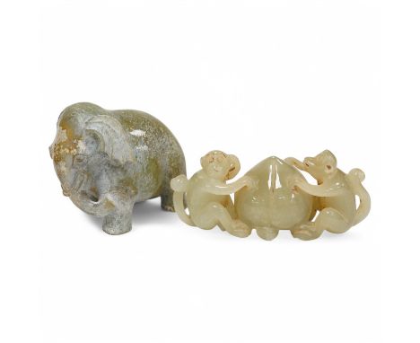 A Chinese jade monkey group and a bowenite jade elephant, largest 9cm wide. Condition - good (2)