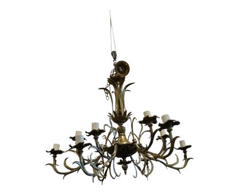 A large ornate  brass six branch twelve light chandelier, 74cm high x 88cm wide. Condition - good