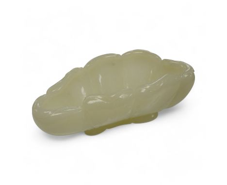 A Chinese jade ‘lotus’ shaped brush washer, 13cm wide. Condition - good