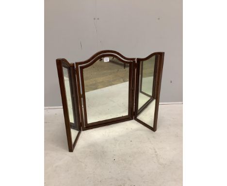 An early 20th century mahogany triple plate toilet mirror, height 67cm. Condition - fair, plate spotted Provenance: Constable