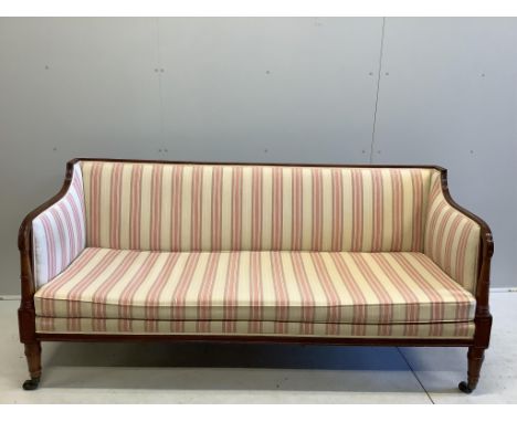 A George III mahogany settee, recently re-upholstered, width 193cm, depth 78cm, height 87cm. Condition - good The stuffing ma