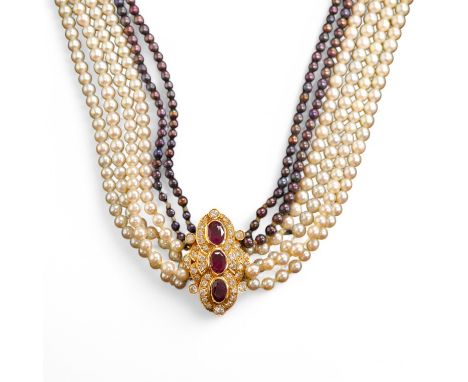 A cultured pearl, ruby and diamond necklace, the clasp set with oval rubies and brilliant-cut diamonds, to a six-strand torsa