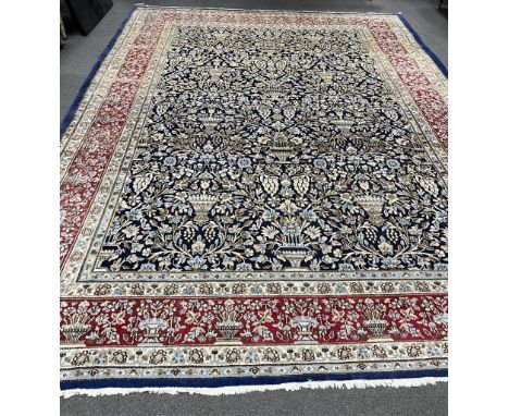 A North West Persian blue ground carpet, 394 x 284cm. Condition - good
