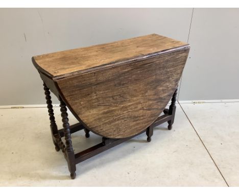 A 17th century style mahogany gate leg table, width 97cm, depth 37cm, height 72cm. Condition - fair