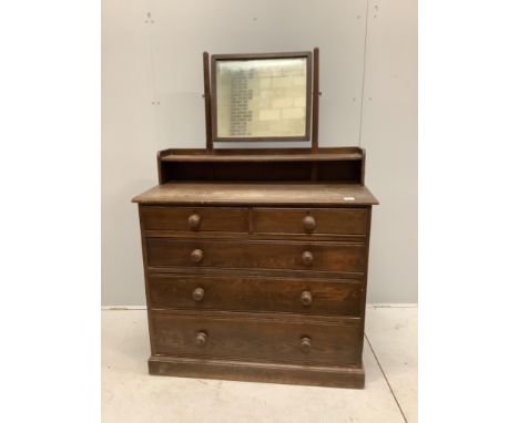 An early 20th century oak dressing chest, width 107cm, depth 49cm, height 155cm. Condition - poor Provenance: Constables Towe