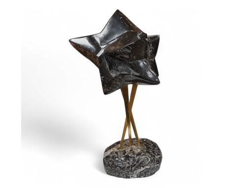 Annette Rowdan, a black marble modernist sculpture "Star of India" and catalogue of her work. 57cm high. Condition - metalwar