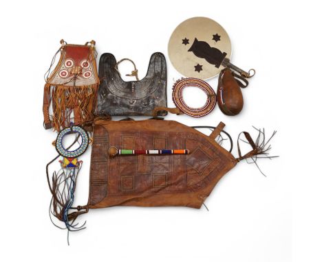 A collection of tribal leather bags and African beadwork items to include water flask and necklaces. Condition - mostly fair