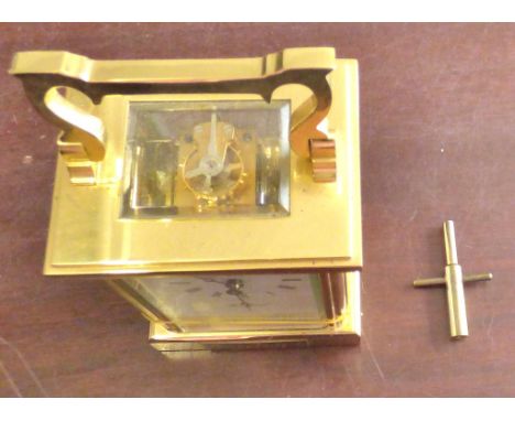Good looking carriage clock- Woodford of England, seven jewel, appears in good order, but needs some attention