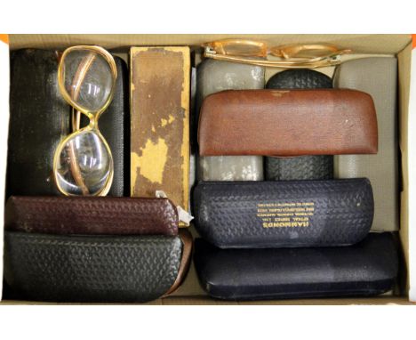 A quantity of vintage spectacles.