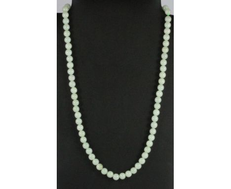 A single strand of polished jade beads, bead W. 7mm necklace L. 56cm.