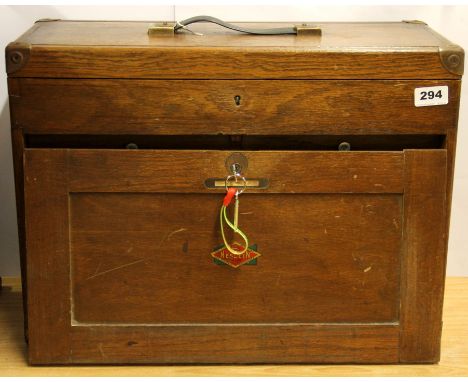 A vintage oak Neslin tool cabinet, 51 x 36 x 23cm.