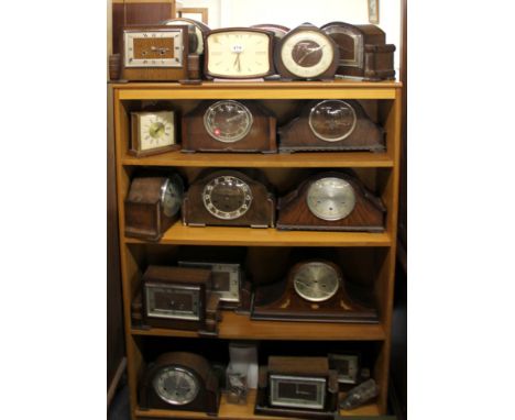 A quantity of vintage clocks and clock movements.
