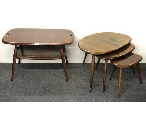 A nest of three Ercol type pebble tables and a similar coffee table.