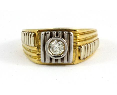 A gentleman's 18ct yellow and white gold ring set with a solitaire diamond (approx. 0.5ct), (W).