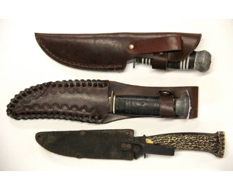 Three vintage daggers.