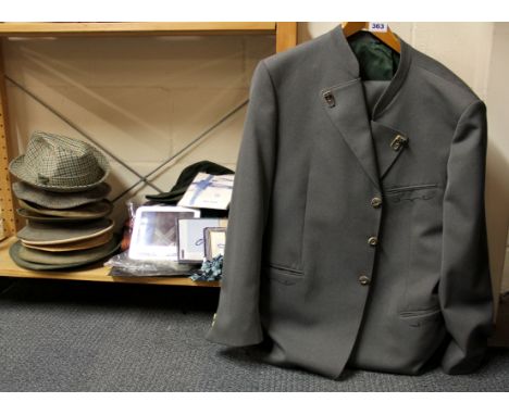 A vintage gentleman's Austrian suit with a collection of vintage gentleman's hats and accessories.