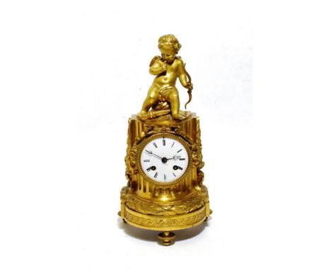 An Ormolu Striking Mantel Clock, circa 1880, surmounted by a winged cherub, acanthus leaf decorated base, enamel dial with Ro