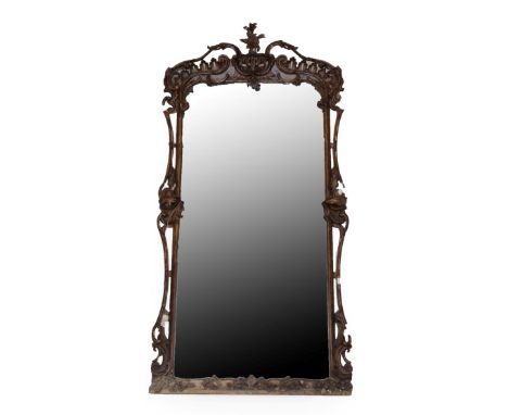 A Victorian Gesso Overmantel Mirror, circa 1860, with original mirror plate within a simulated wood frame with acanthus scrol